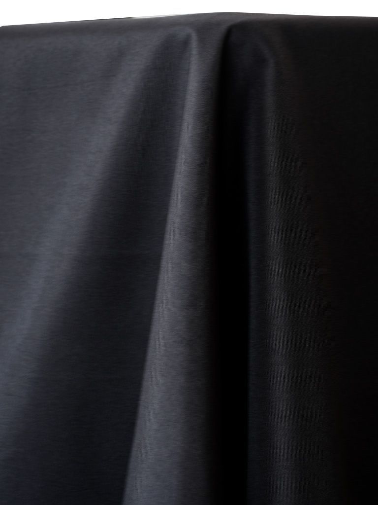 Black tablecloth draped over a table.