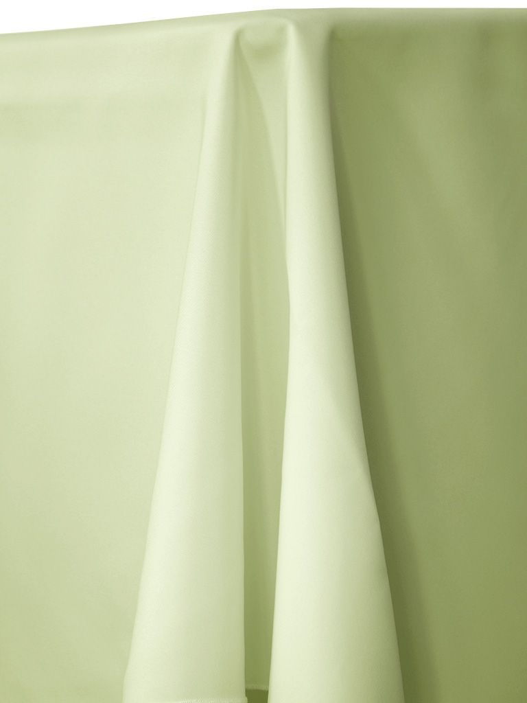 Light green tablecloth draped over a table.