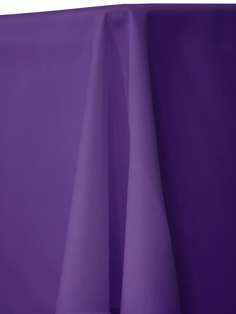 Purple tablecloth draped on a table.