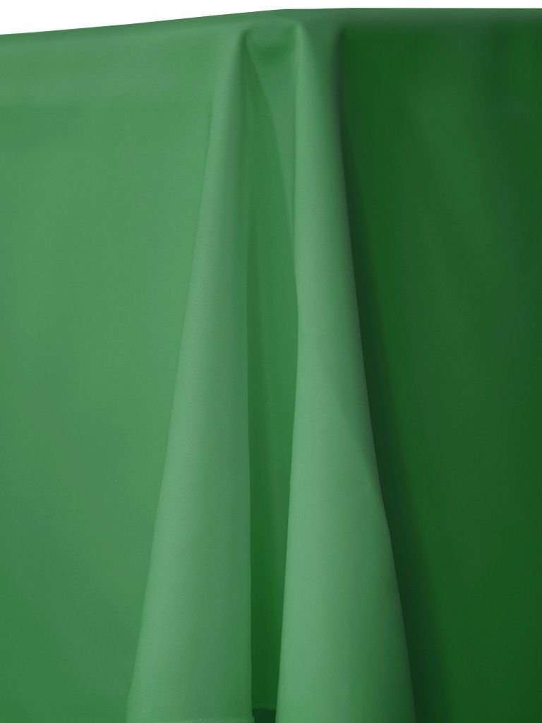Green fabric draped over a table.