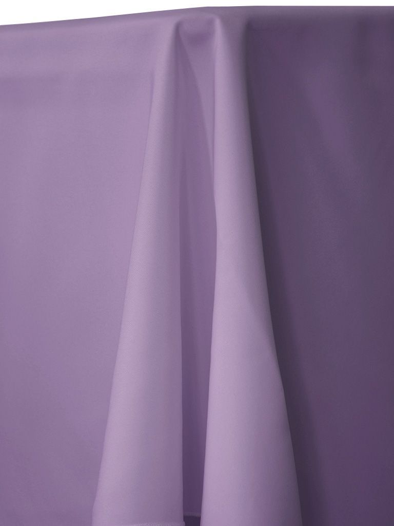 Lavender tablecloth draped over a table, with folds and shadows.