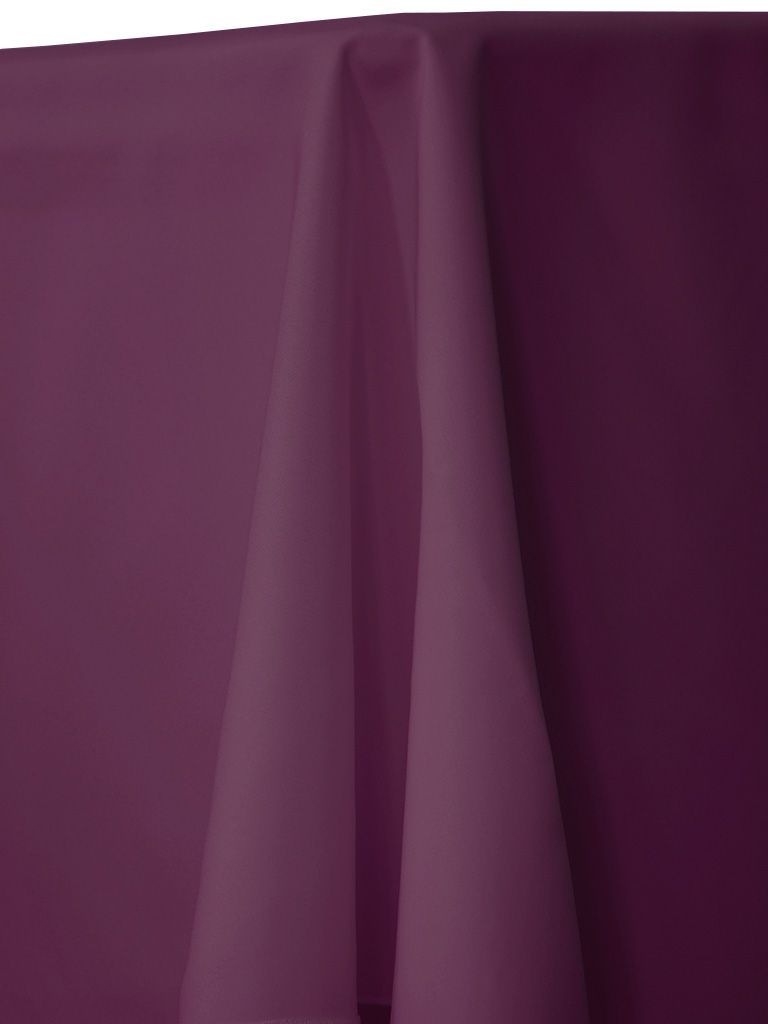 Solid plum-colored tablecloth draped over a table.