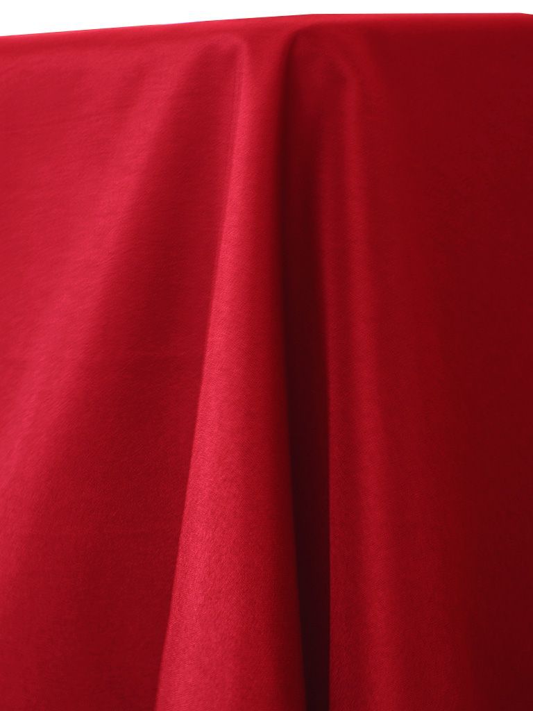 Red fabric draped, showing folds and texture.