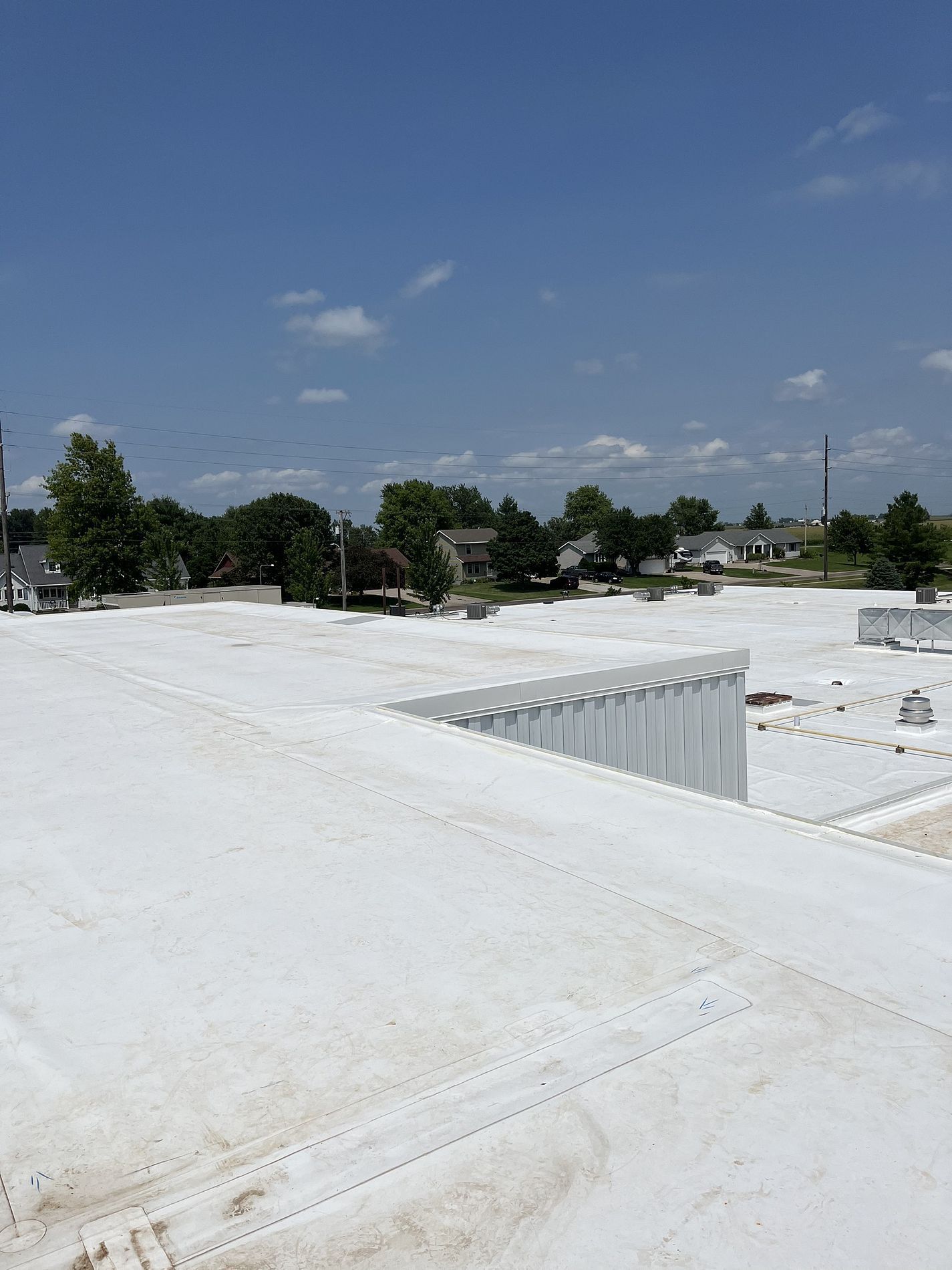 60 Mil TPO School Re-Roof | Prairie City, IA