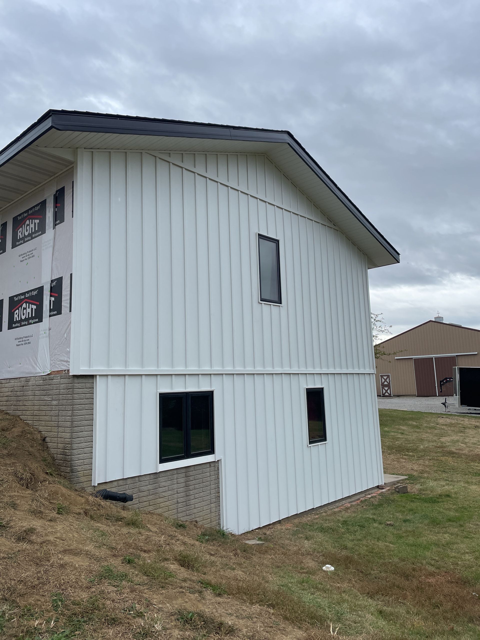 /vertical Vinyl Siding Installed In Pella, Ia