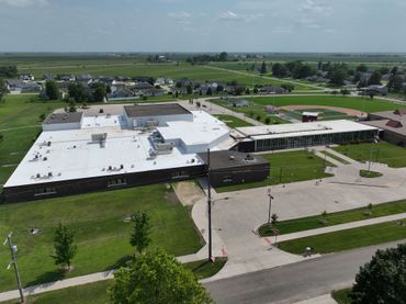 Commercial flat roof experts at PCM schools in Prairie City, IA.