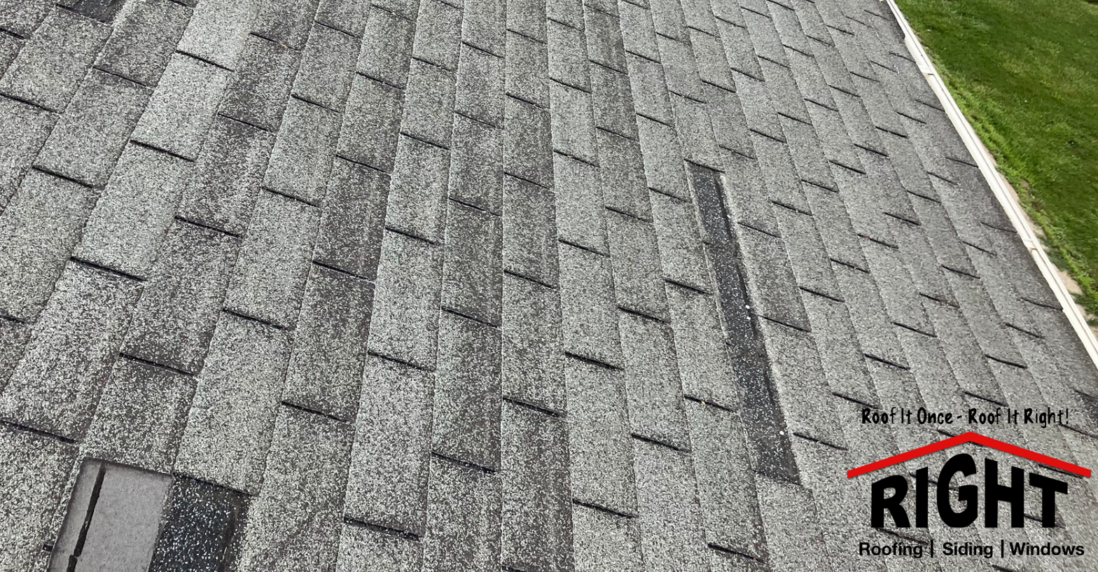 Missing shingles on a shingled roof in Des Moines, IA.