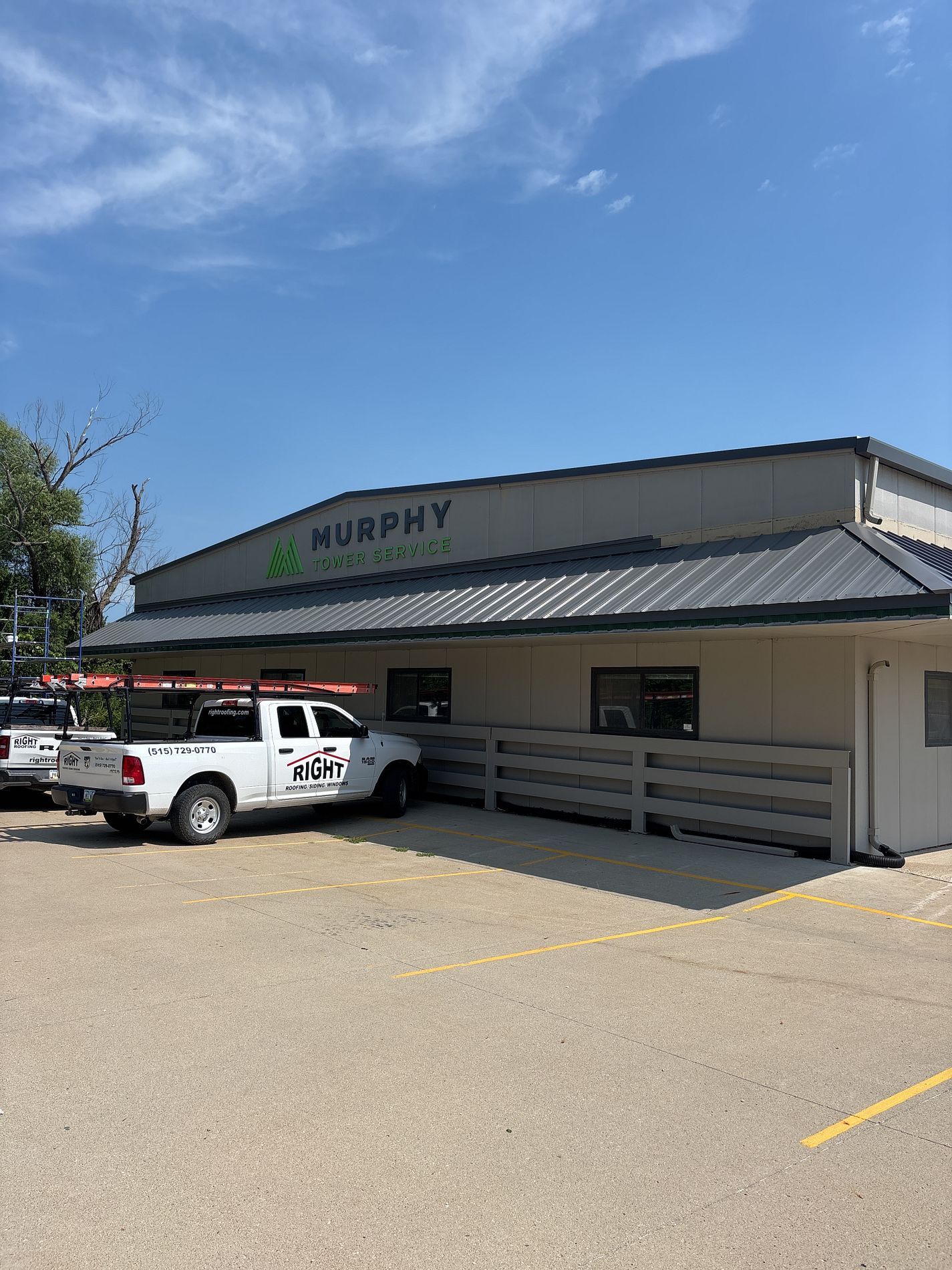 Custom metal awning on commercial building in Carlisle, IA.