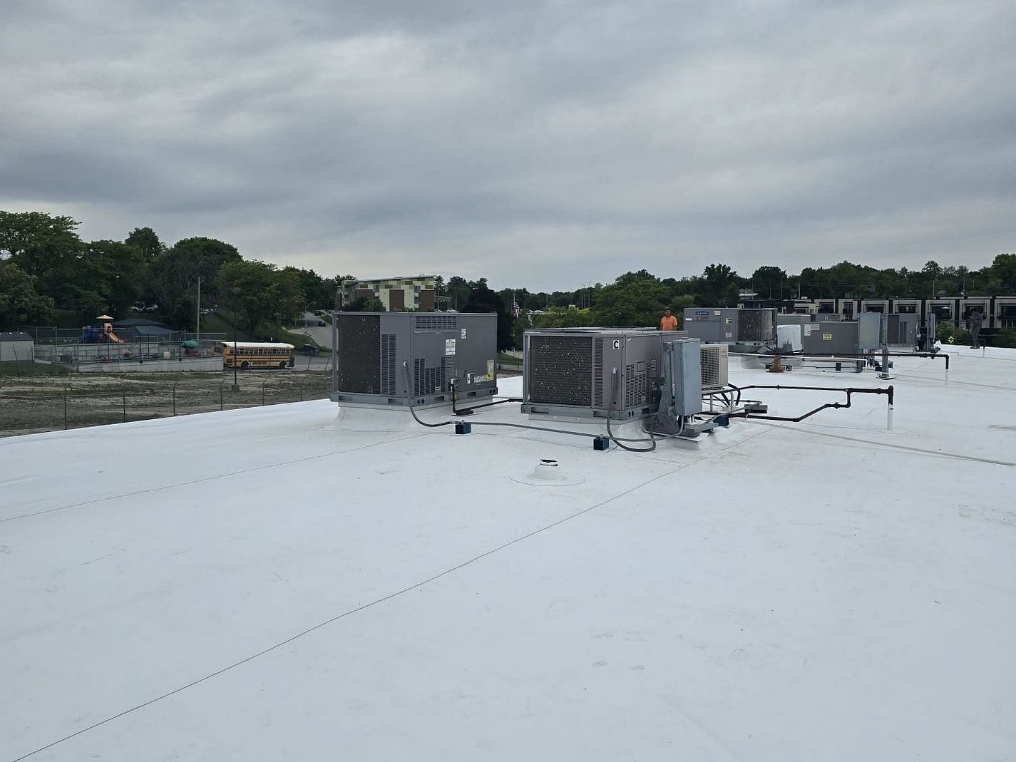 TPO re-roof on strip mall in Des Moines, IA.