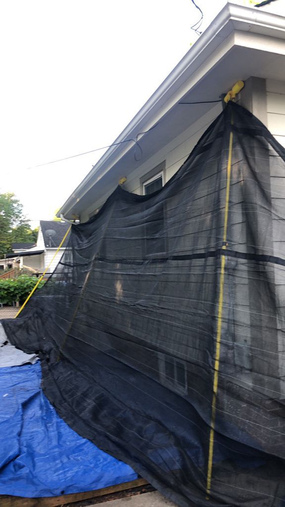 protecting the landscaping while roofing in West Des Moines