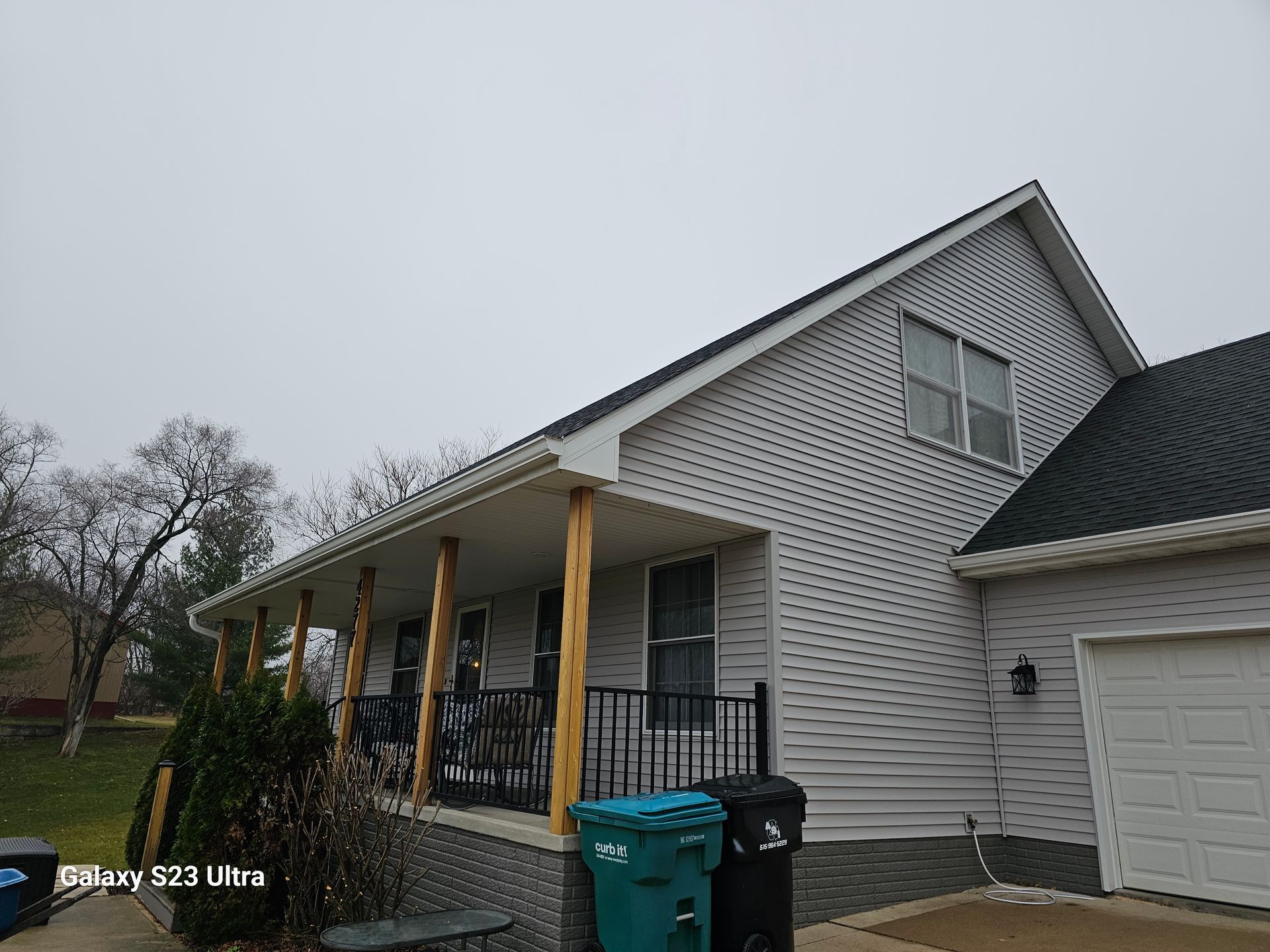 front porch with new vinyl siding