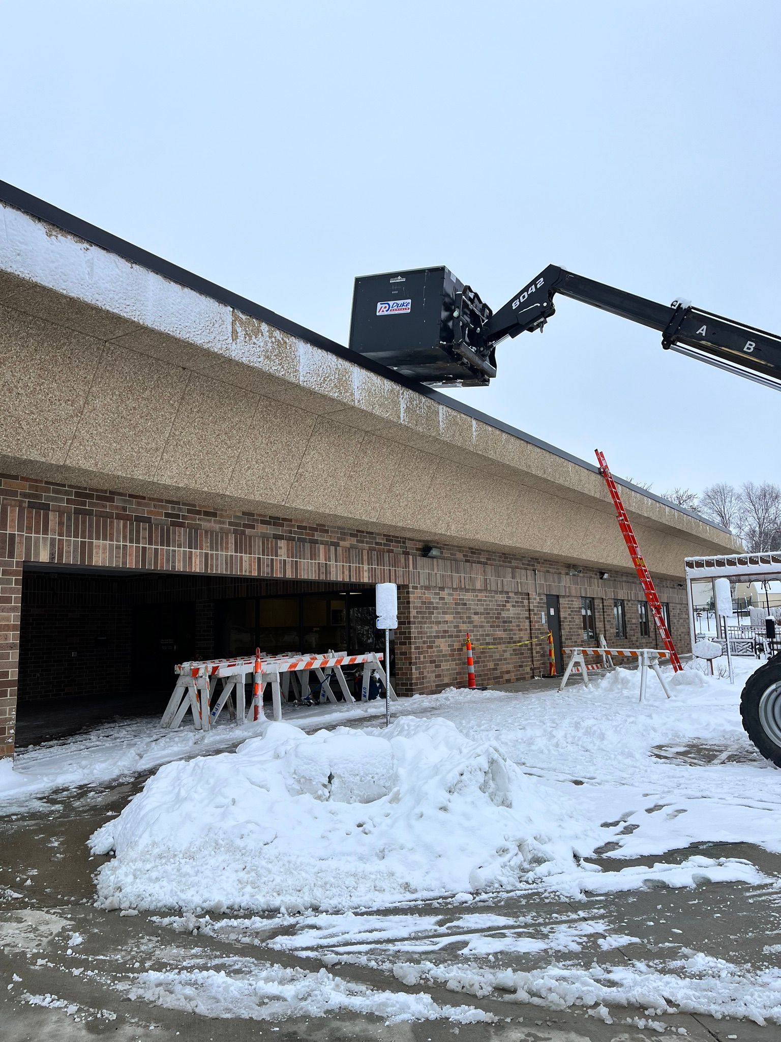 Lift placing Unit on Roof After Roof Replacement | Urbandale, IA