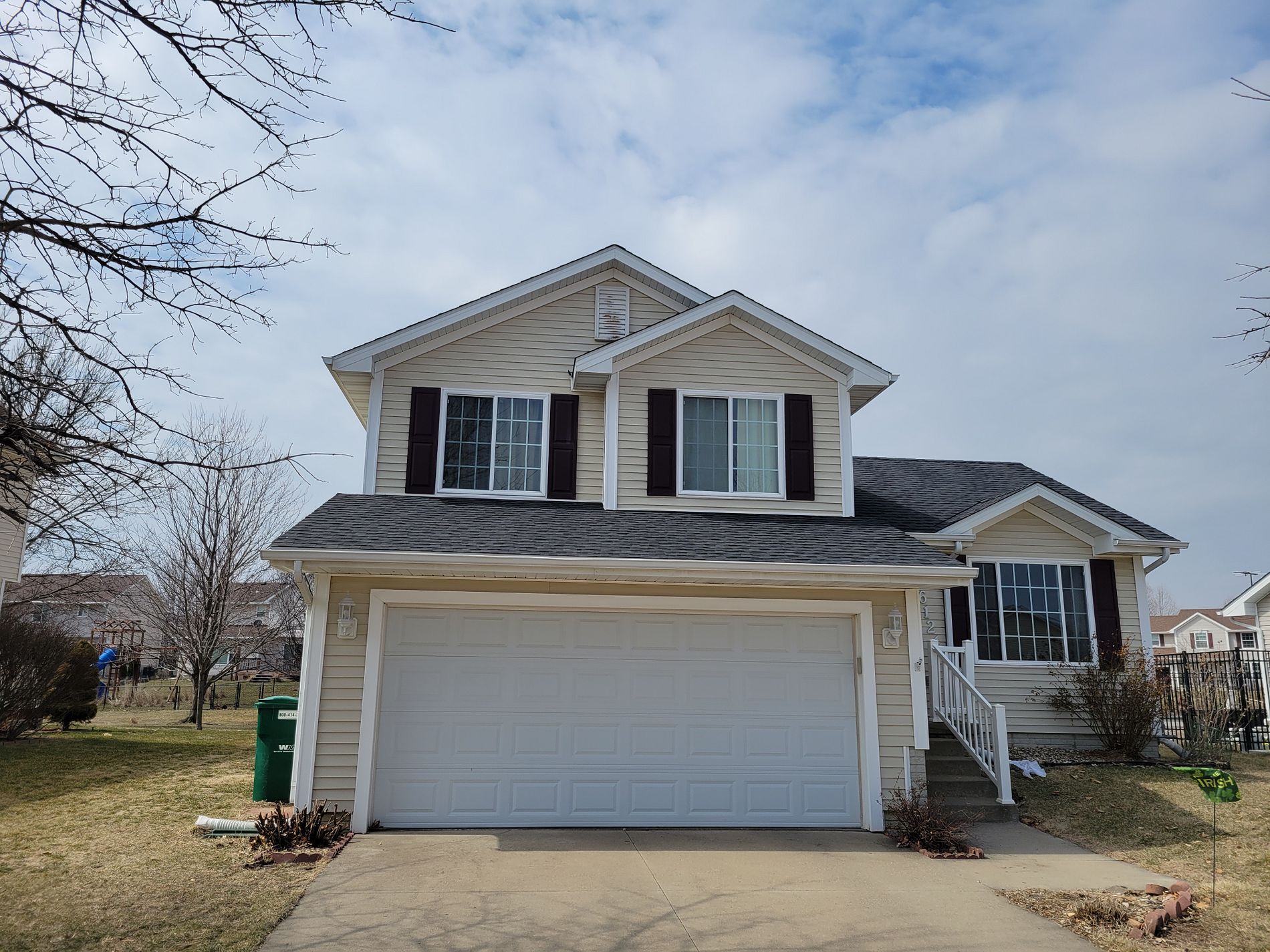 Roof replacement in Johnston, IA with durable shingles in the color of charcoal.