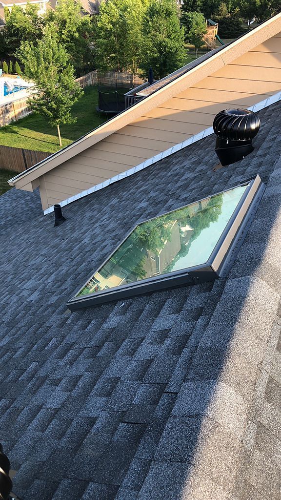 New skylight installed on an asphalt roof in Waukee, IA