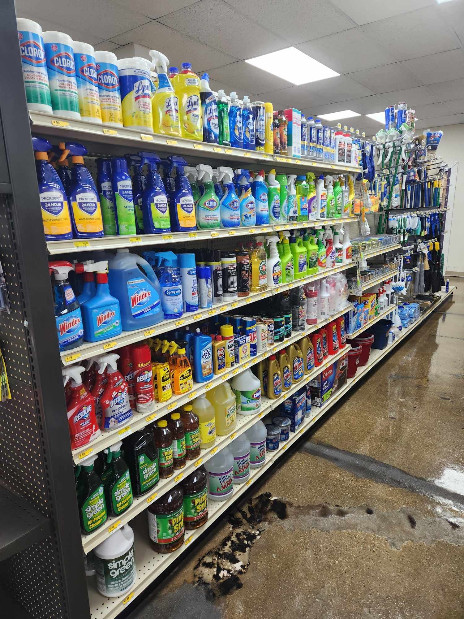 A grocery store aisle filled with cleaning products.