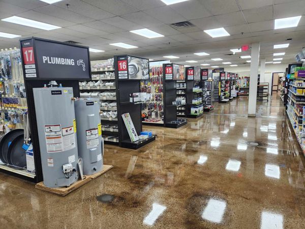 The inside of a hardware store with a plumbing section.