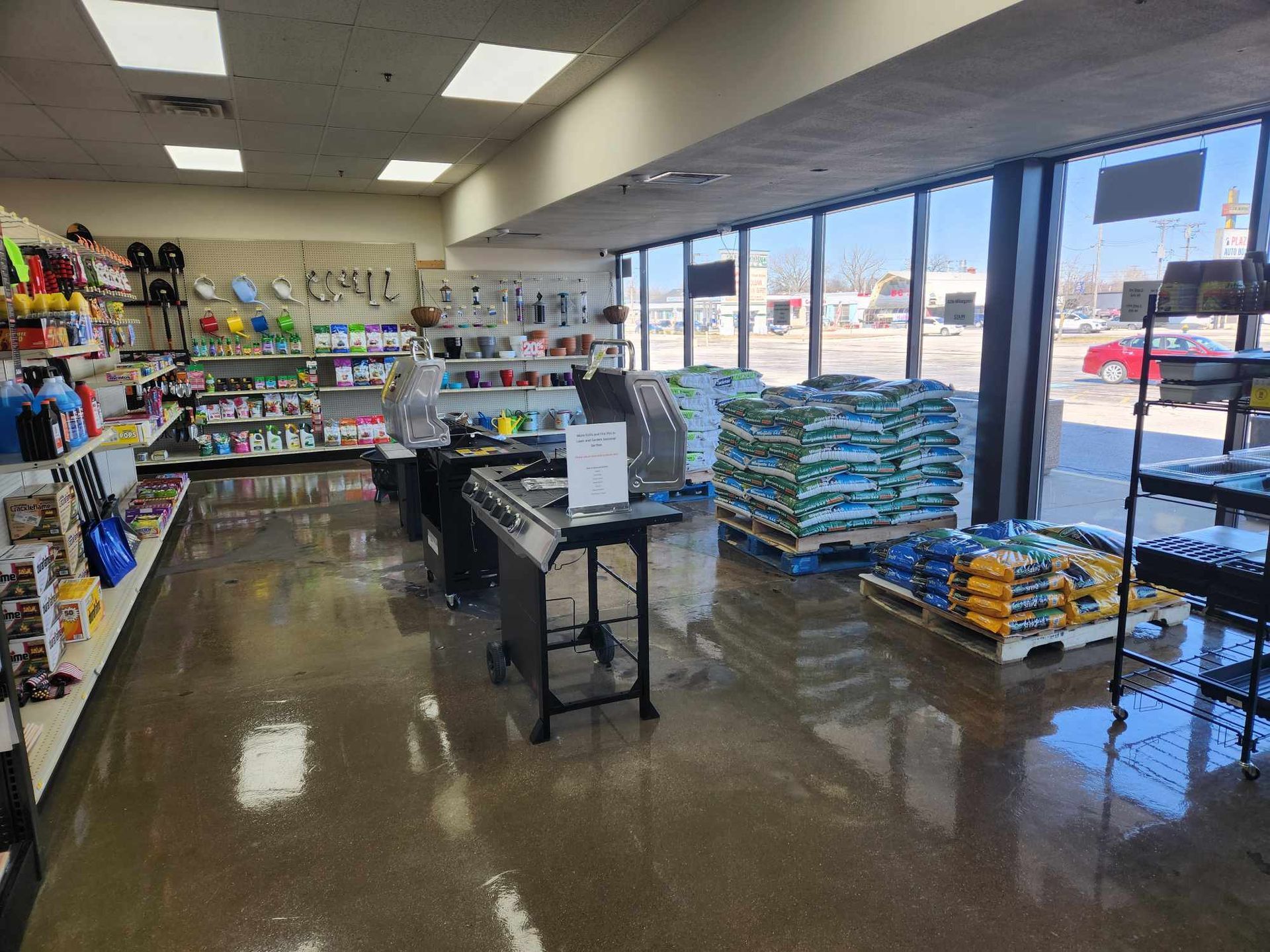 a store filled with lots of products and a grill