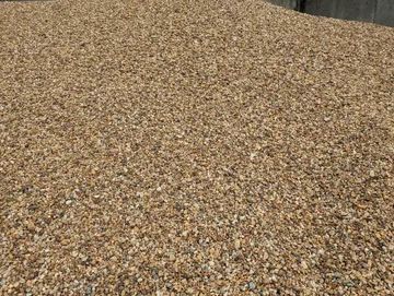 Pile of tan and light brown gravel.