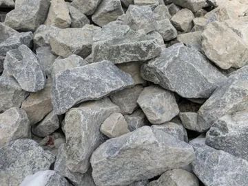 Pile of gray and beige rocks.