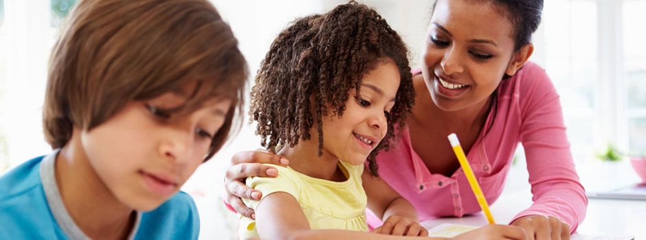 Boy and a girl with a teacher