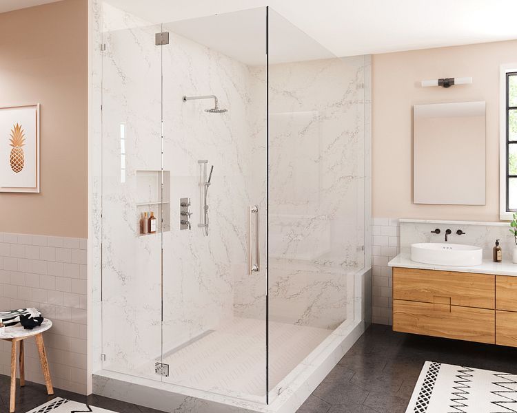 A bathroom with a walk in shower and a sink.