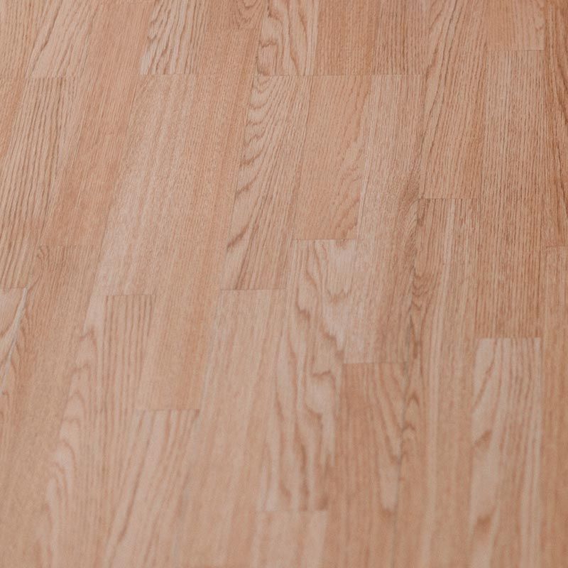 A close up of a wooden floor with a lot of grain.