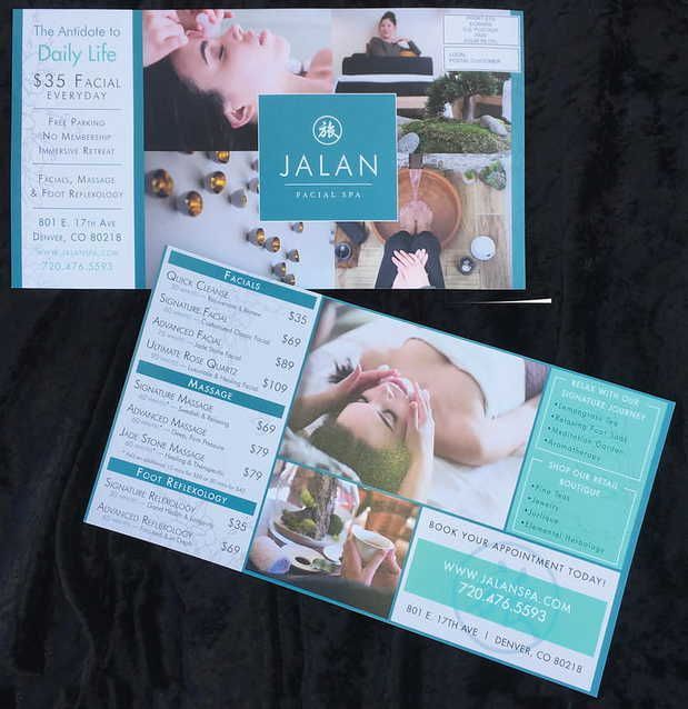 A flyer for jalan spa shows a woman getting a massage
