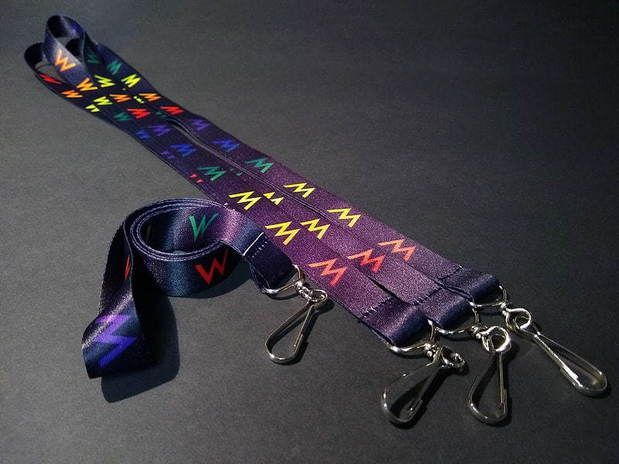 A purple lanyard with the letter m on it