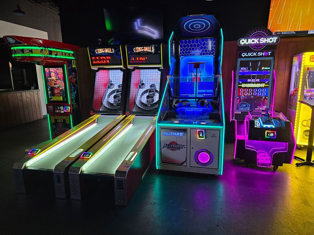Arcade with illuminated games