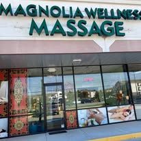 A magnolia wellness massage is located in a shopping mall.
