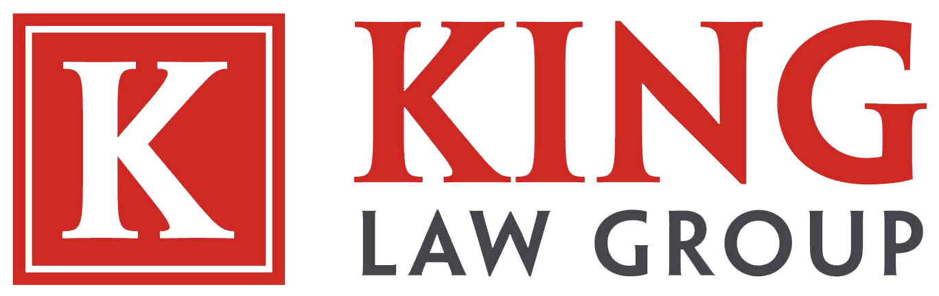 The logo for the k king law group is red and white.