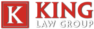 The logo for the k king law group is red and white.