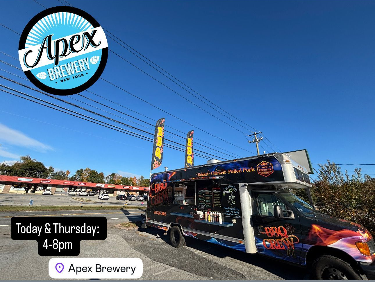 Food truck parked outside Apex Brewery on a sunny day. Text on truck and sign.