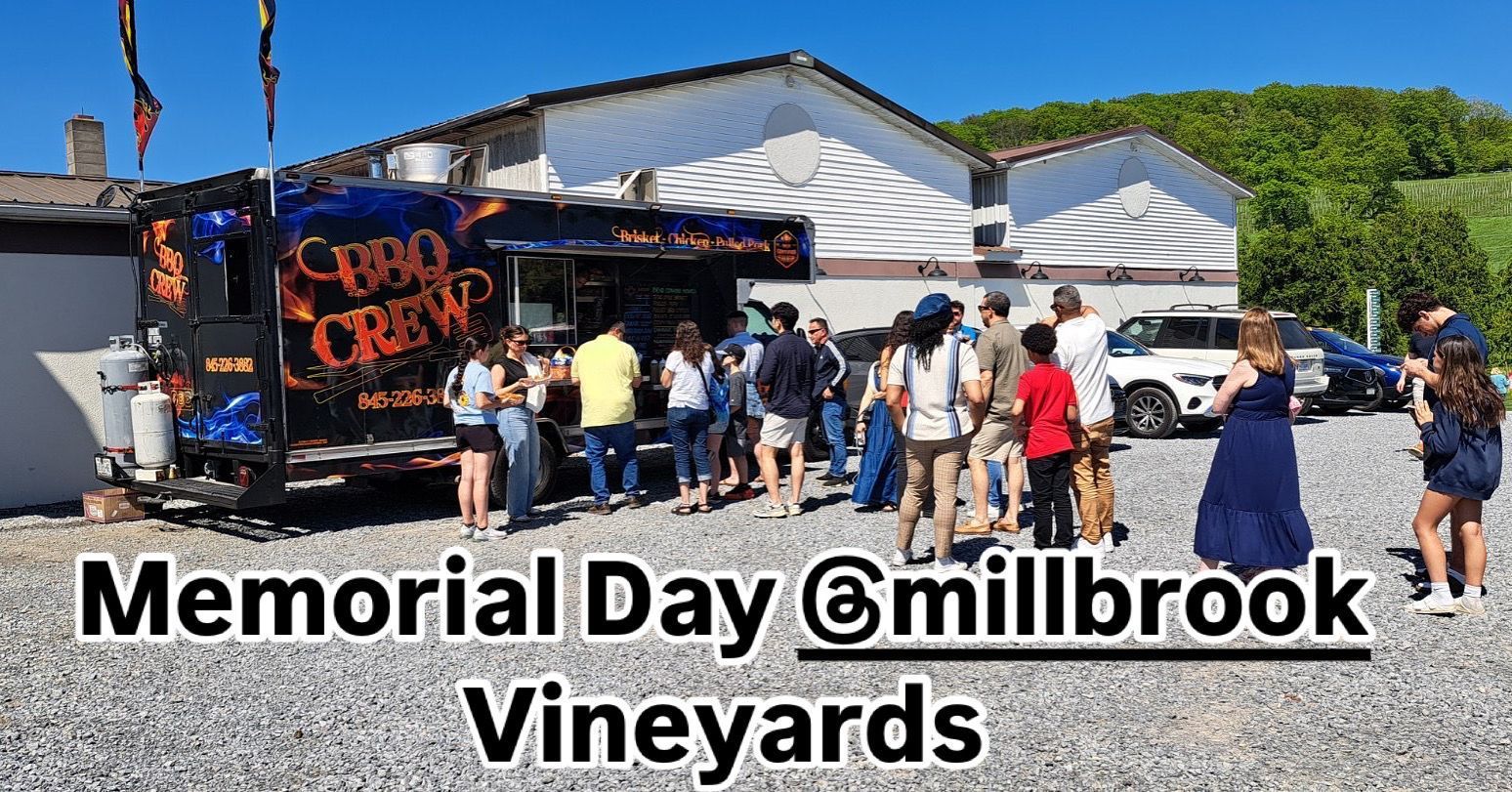 Memorial Day event at Millbrook Vineyards with people, a food truck, and cars.