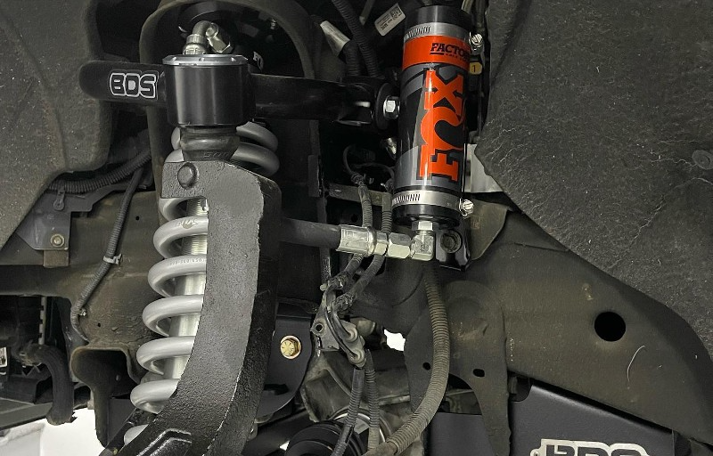 A close up of a shock absorber on a car