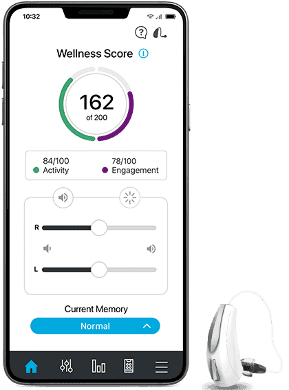 A phone with a wellness score app on it next to a hearing aid.