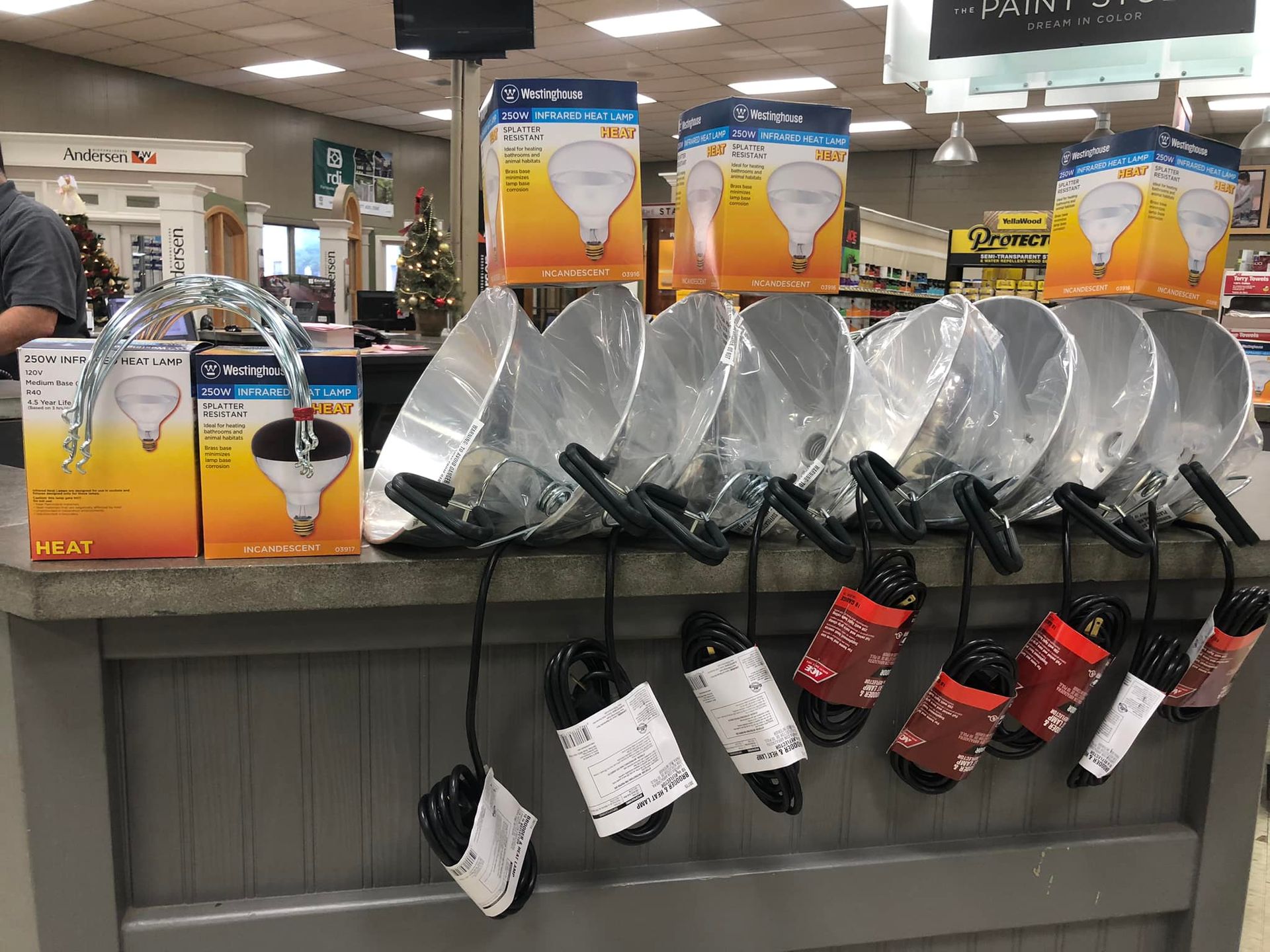 A bunch of lights are sitting on a counter in a store