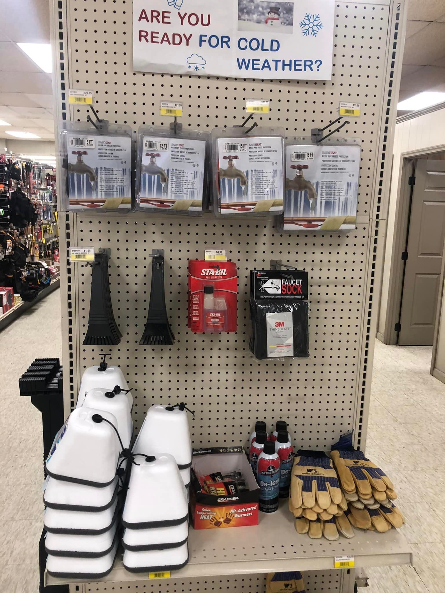 A store shelf with a sign that says are you ready for cold weather