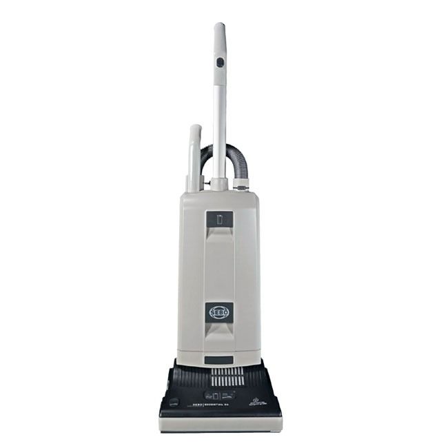 Upright beige vacuum cleaner on white background.