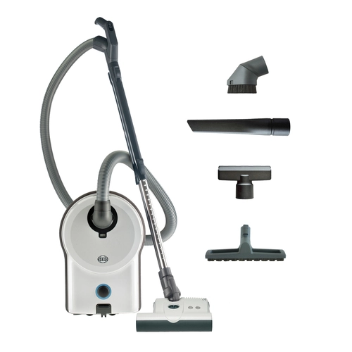 White vacuum cleaner with attachments, including brush and crevice tools.