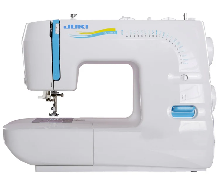 White Juki sewing machine with blue accents; side view.
