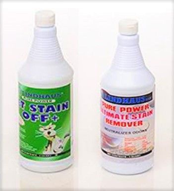 Two white bottles of stain remover, one green label (Pet Stain Off+), one red label (Pure Power Ultimate Stain Remover).