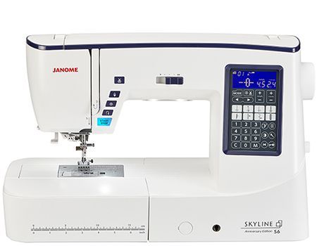 White Janome Skyline S3 sewing machine with LCD screen and buttons.