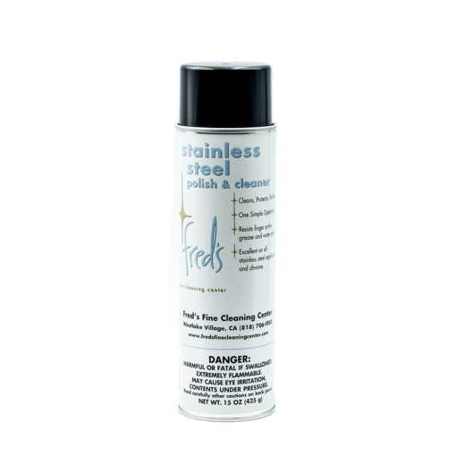 Stainless steel polish and cleaner spray can with black top, white label.