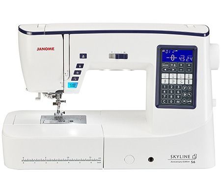 White Janome Skyline S6 sewing machine with digital display and controls.
