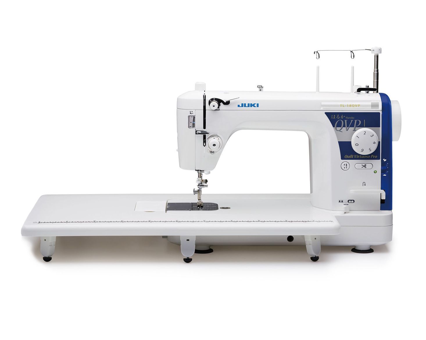 White JUKI sewing machine with an extension table, set against a plain white background.