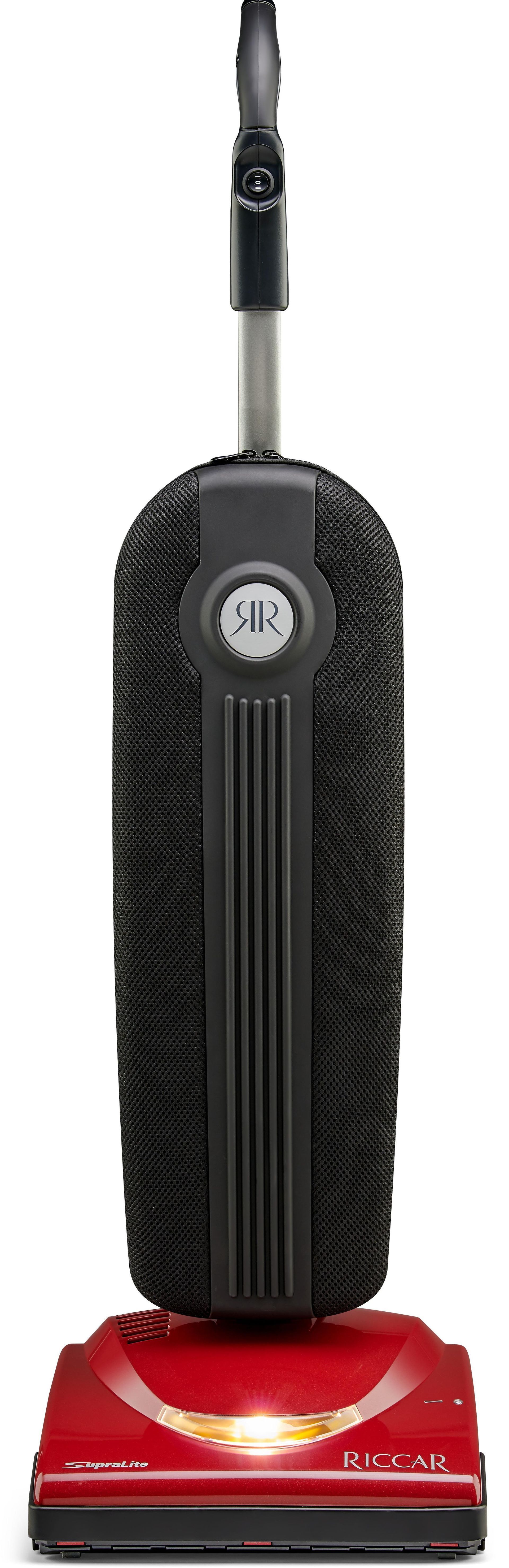 Upright vacuum cleaner with a red base and a textured black vertical body against a white background.