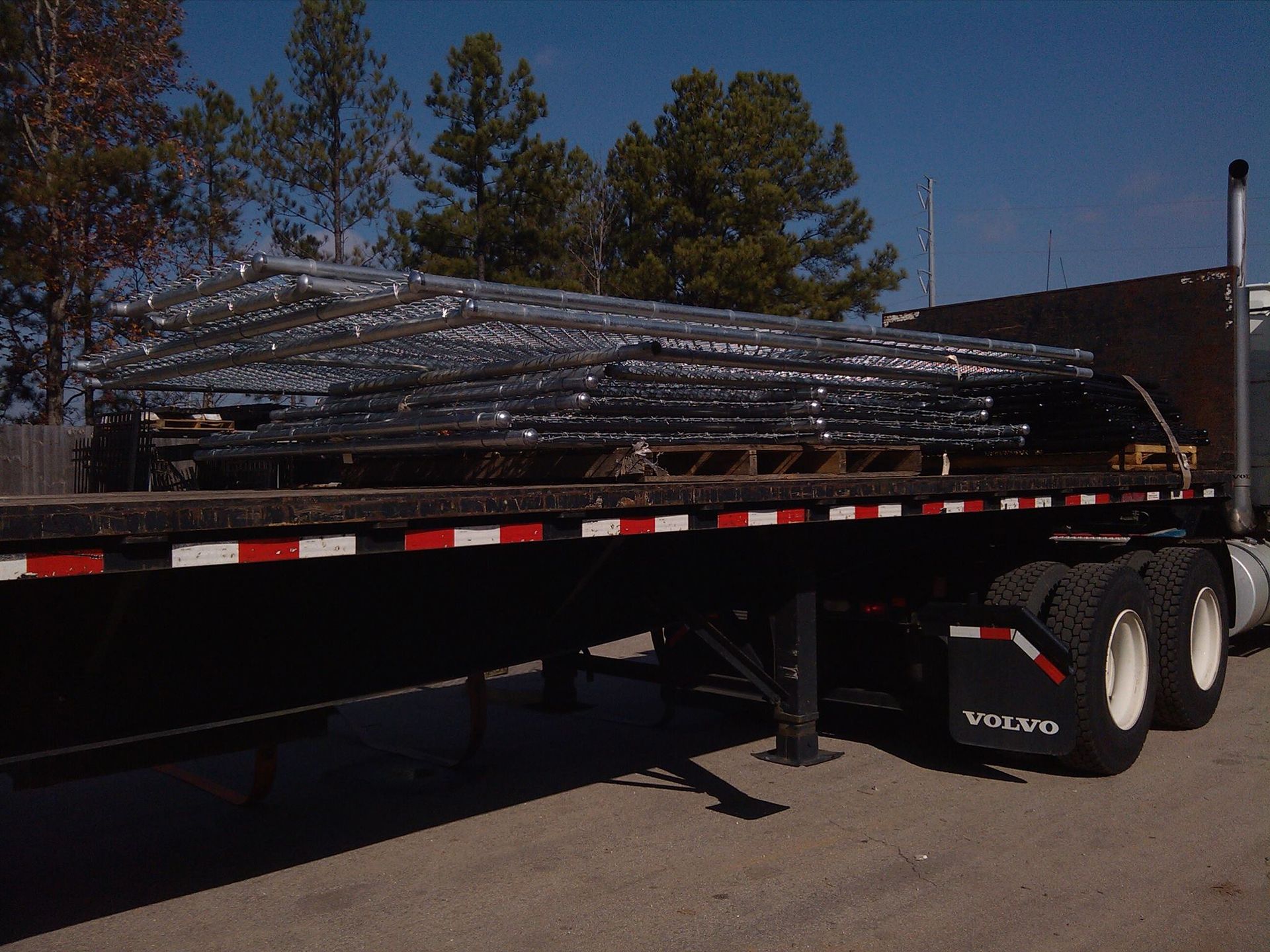 Truck carrying fencing materials