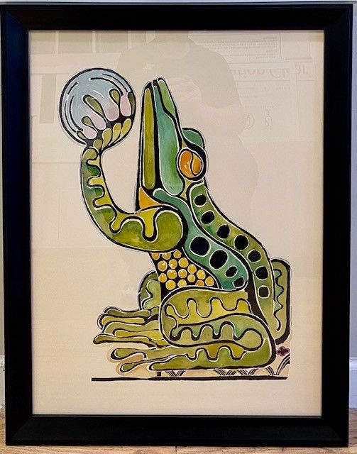 Stylized green frog holding a light blue orb; against a cream background, in a black frame.