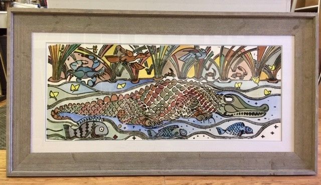 Cartoon illustration of an alligator in a swamp with colorful plants and other animals. Framed in a gray frame.